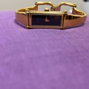 Classic Gucci gold watch